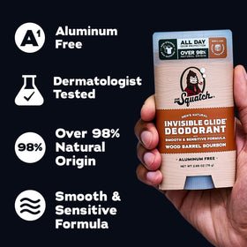 Dr. Squatch deodorant stick held in hand displaying travel size convenience