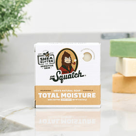 Dr. Squatch bar held in hand showing scale and easy grip