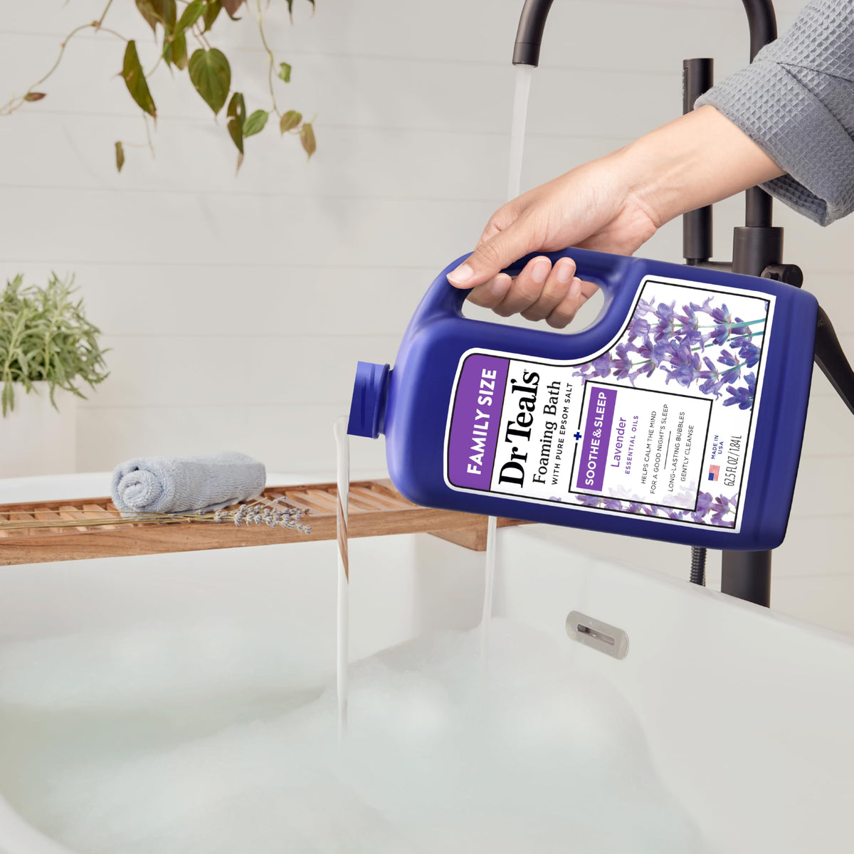 Dr Teal's product in use in a calming bathroom for evening wind-down