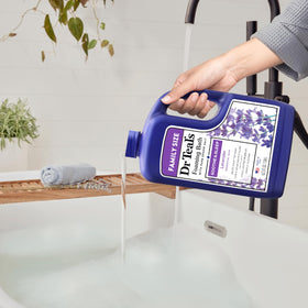 Dr Teal's product in use in a calming bathroom for evening wind-down