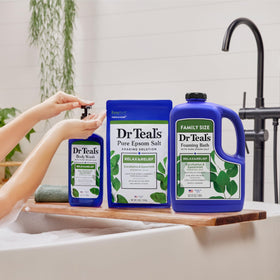 Bathroom lifestyle scene with Dr Teal's foaming bath creating a relaxing soak