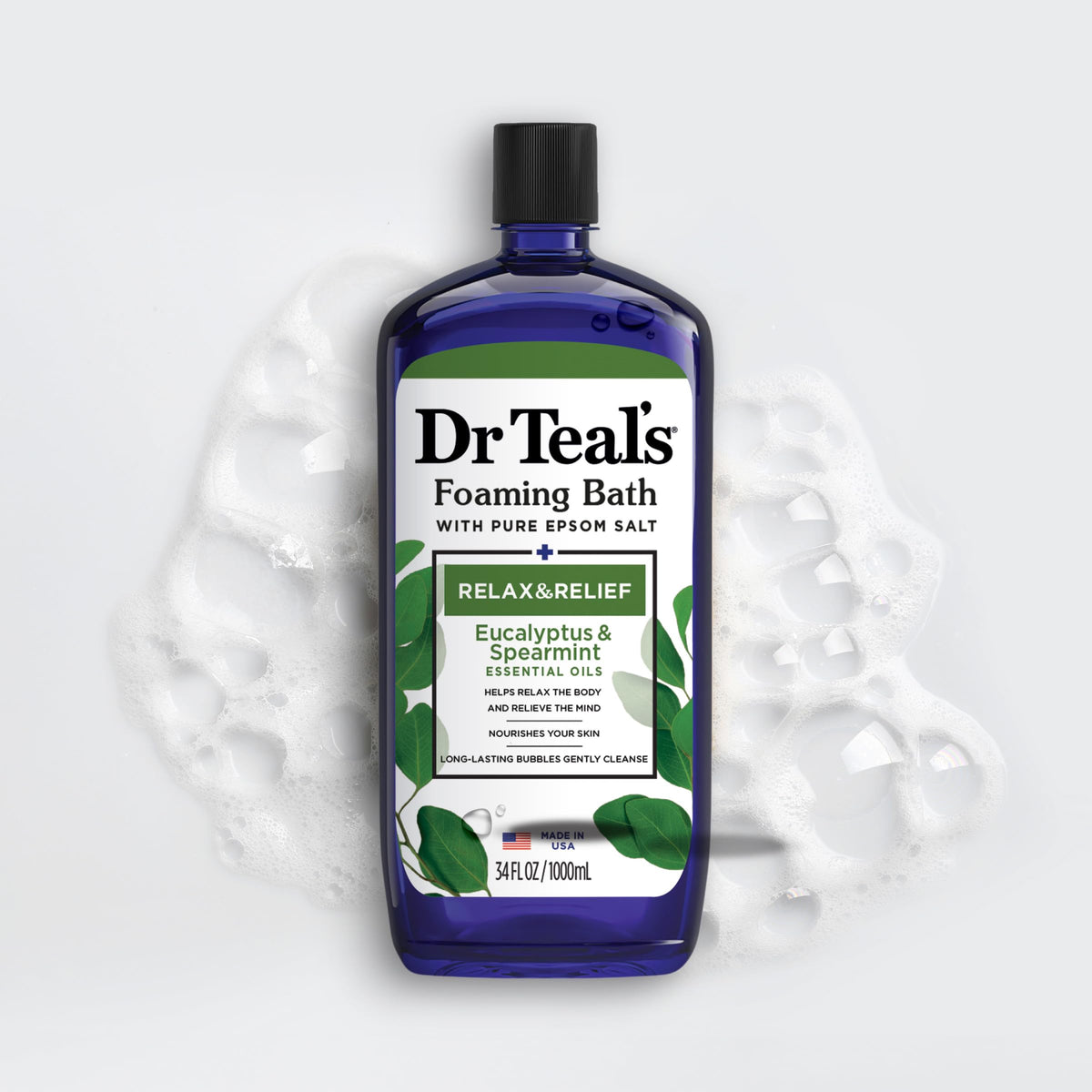 Dr Teal's bottle staged with towel and candle to show calming self-care benefit