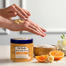 Dr Teal's jar beside a hand for scale illustrating generous 19 oz size