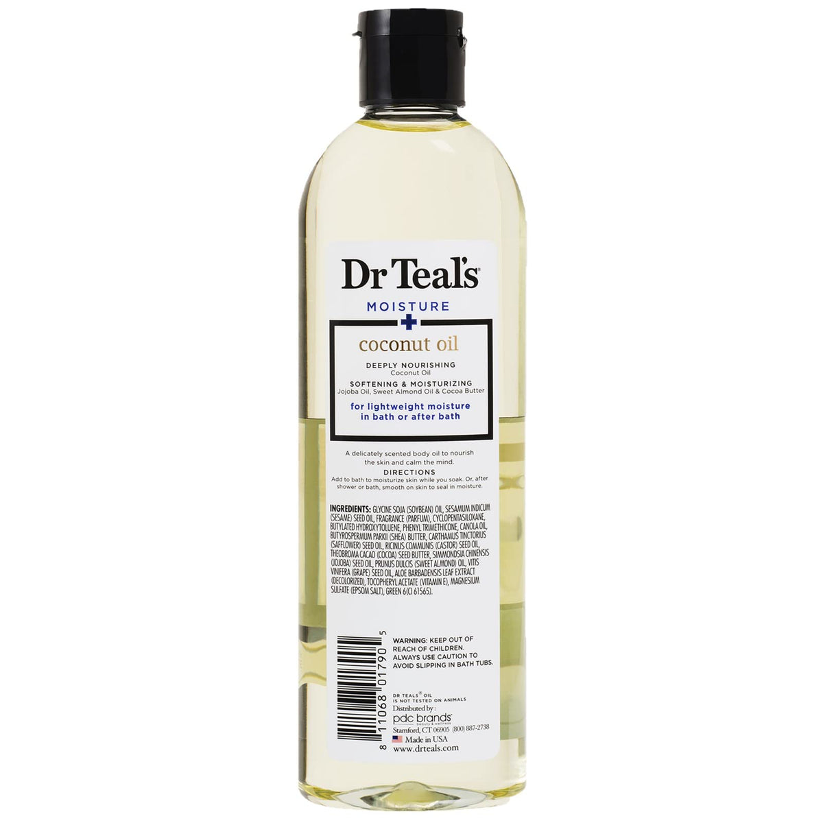 Dr Teal's coconut oil pouring from bottle highlighting quick absorption