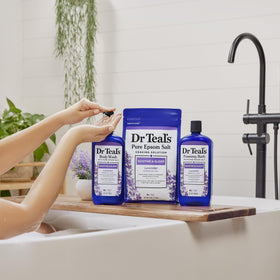 Dr Teal's bowl mixing body wash with Epsom salt to create exfoliant