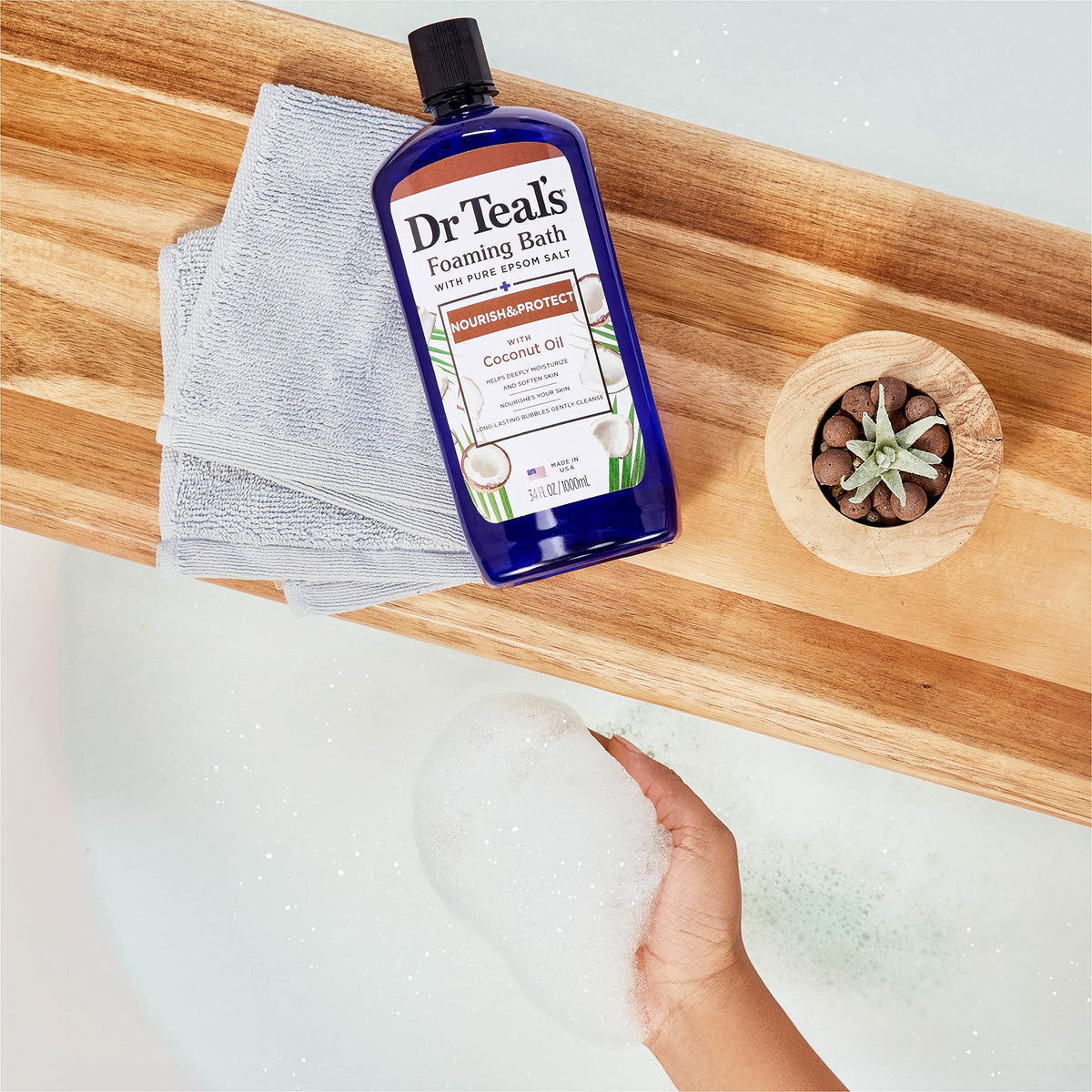 Dr Teal's foaming bath creating bubbles in tub for a calming soak