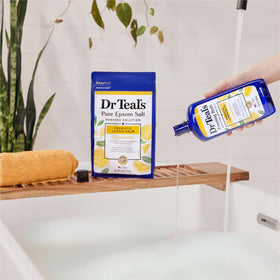 Dr Teal's four-bottle pack arranged to show value and extended supply for regular baths