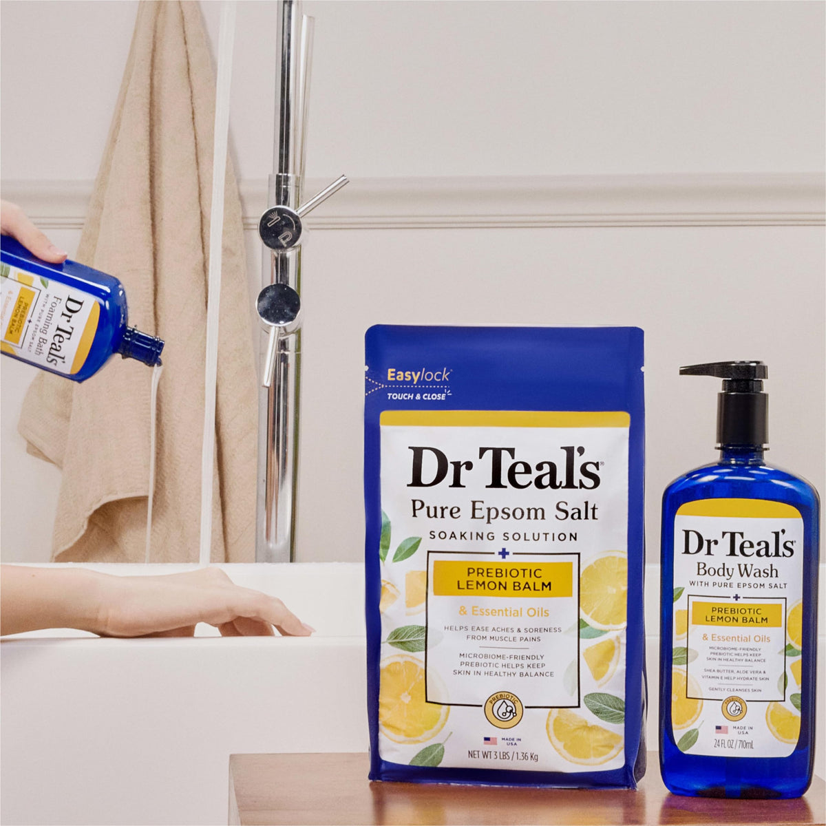 Dr Teal's size comparison with a hand indicating the 34 fl oz bottle scale and convenience