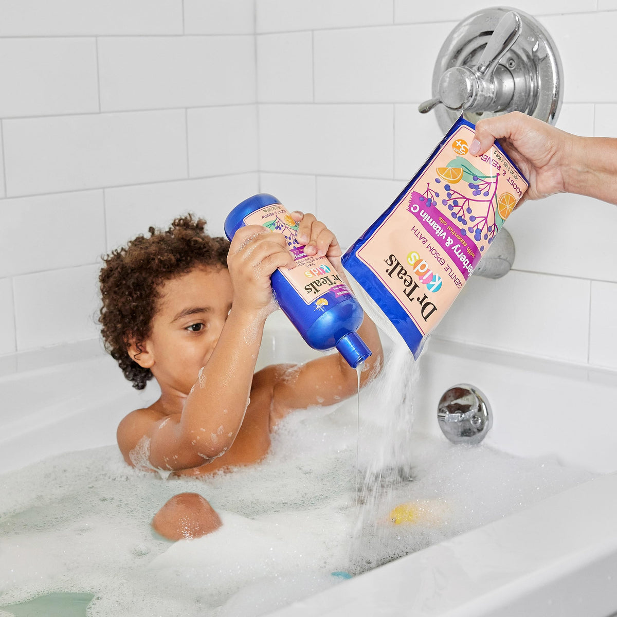 Parent and child using Dr Teal's during bedtime routine for relaxed evenings
