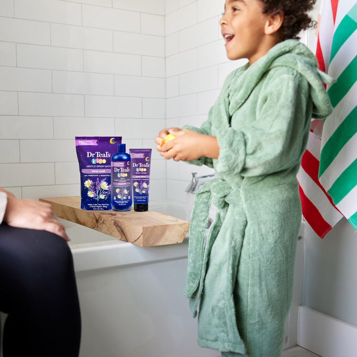 Dr Teal's three-pack beside common household items for accurate size comparison