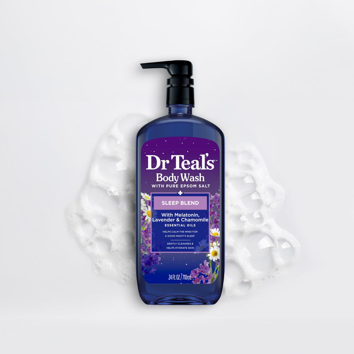 Dr Teal's bottle in a hand showing true 24 fl oz size and scale