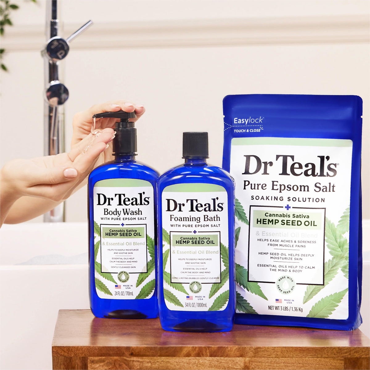 Dr Teal's bottle held in hand showing scale and travel-friendly size benefit