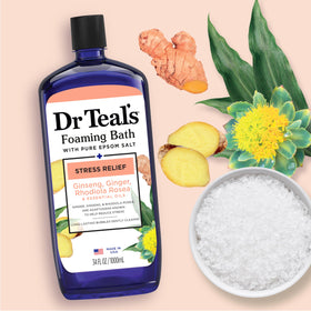 Dr Teal's 34 fl oz bottle in hand showing true product scale and convenience