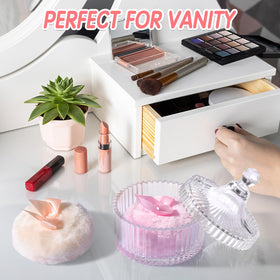 Draupnir puff held in hand to show size and easy control for full-body dusting