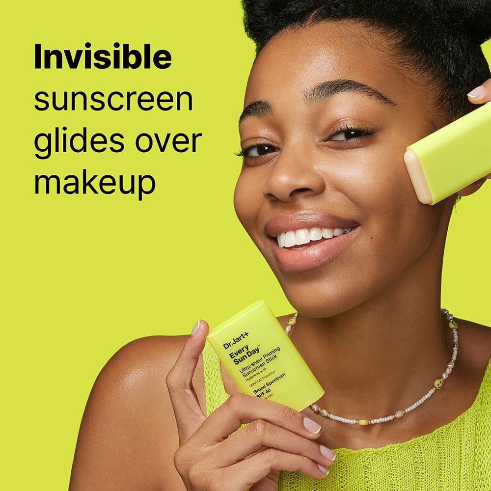 Dr.Jart+ sunscreen stick placed beside makeup bag for easy on-the-go touch-ups