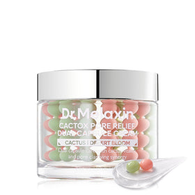Dr.Melaxin front packaging shows product and promises refined pores