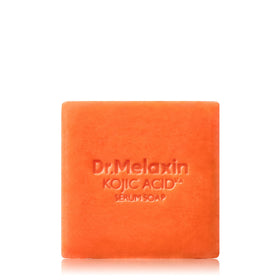 Dr.Melaxin front packaging showing bar and brand, highlights brightening benefits