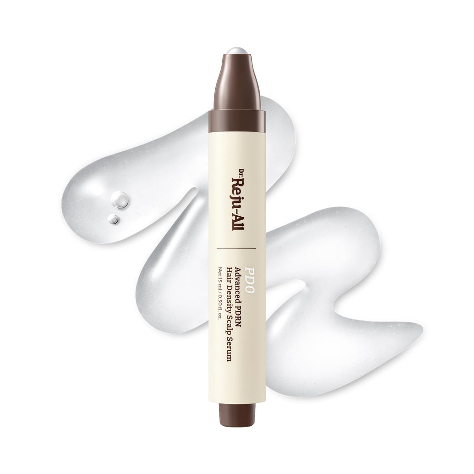 Dr.Reju-All front bottle showing compact roll-on for targeted scalp care