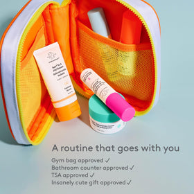 Drunk Elephant Protini cream texture on fingertip showing peptide-rich smoothing benefit