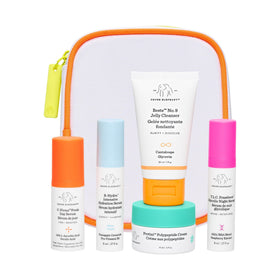 Drunk Elephant front kit display showing all five travel-size products and benefits