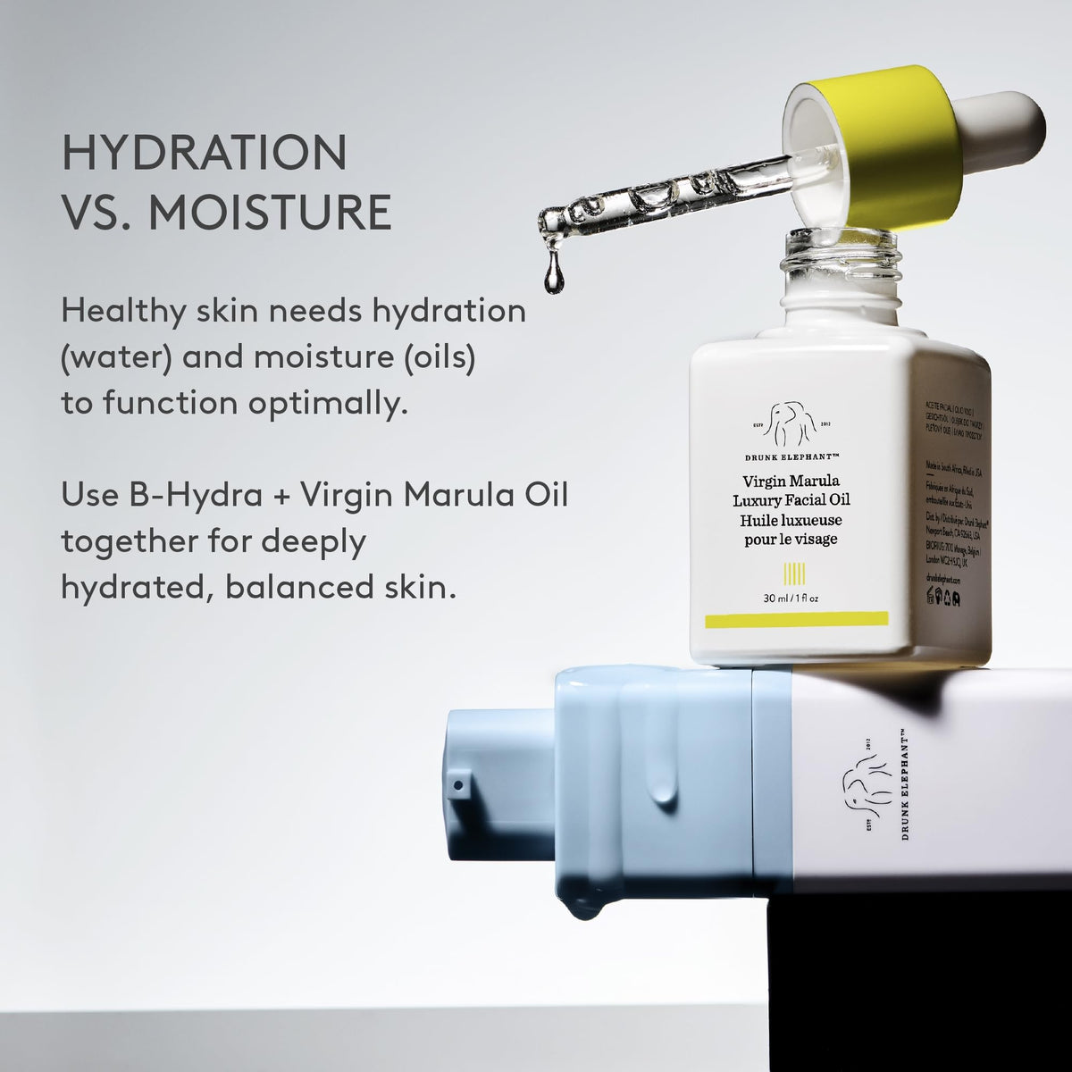 Drunk Elephant bottle staged on a bathroom shelf to suggest integration into daily skincare routine benefit