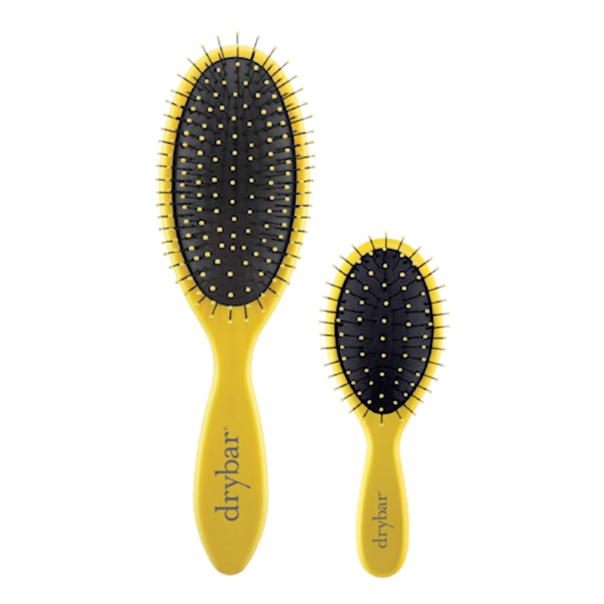 Drybar Lil' Lemon Drop brushing extensions gently to protect bonds and reduce pulling