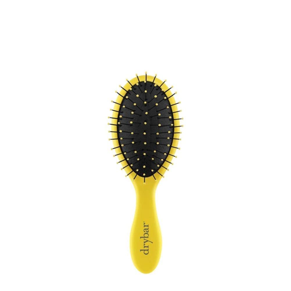 Drybar Lil' Lemon Drop front view showing compact travel-friendly design and easy grip