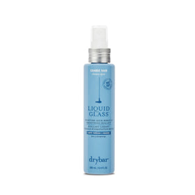 Drybar bottle front view showing sleek packaging and product name for easy identification and shelf appeal