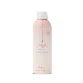 Drybar front packaging shows strong hold benefits and clean styling