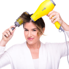 Drybar brush size comparison in hand showing comfortable lightweight handling