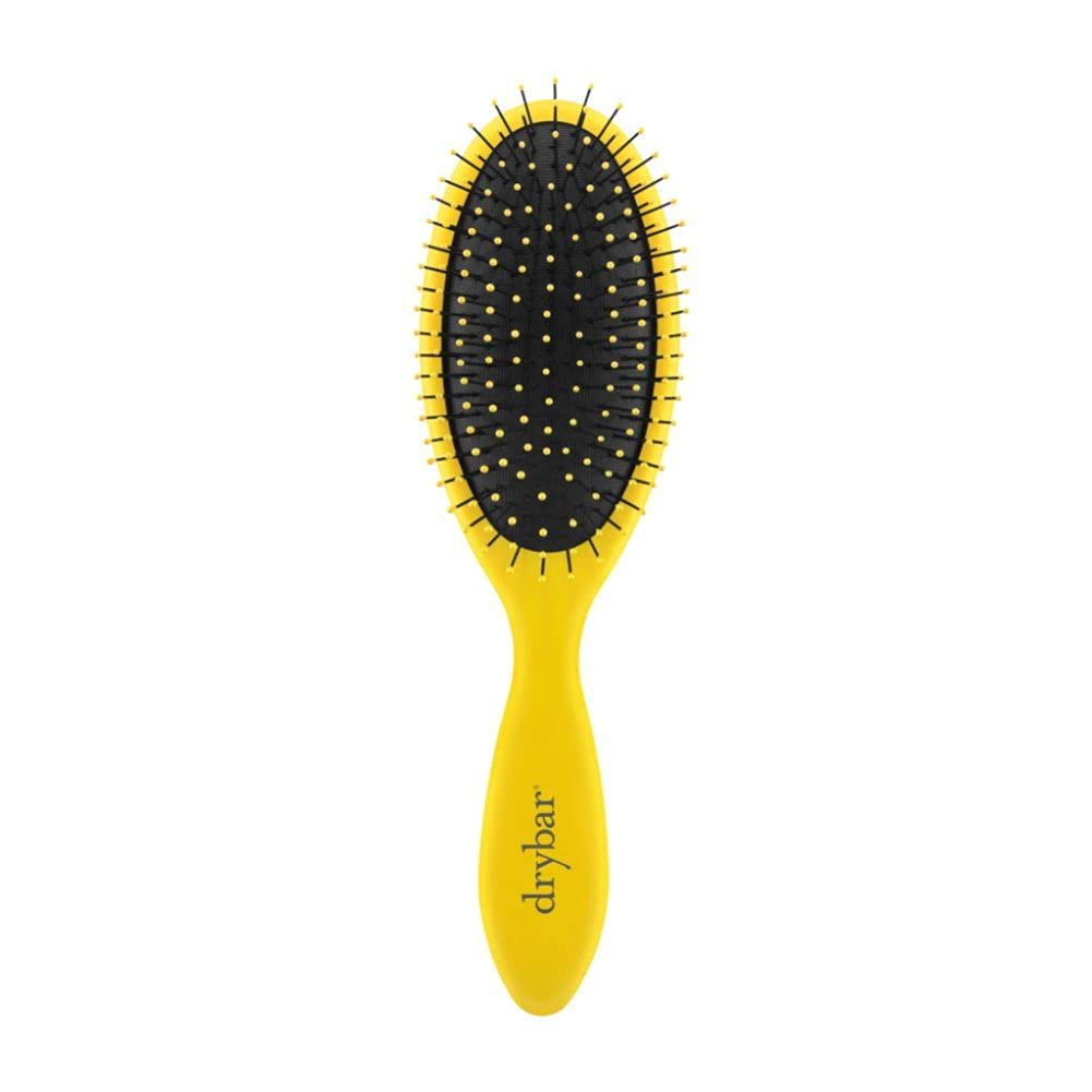 Drybar Super Lemon Drop front view showing ergonomic shape and soft-touch finish for comfortable grip