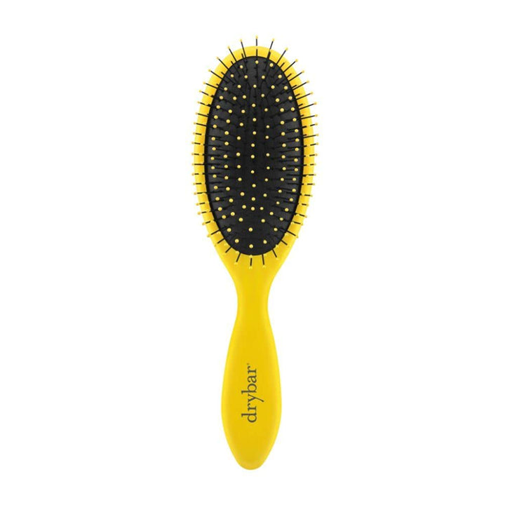 Drybar Super Lemon Drop front view showing ergonomic shape and soft-touch finish for comfortable grip