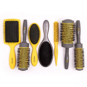 Drybar Super Lemon Drop on bathroom counter in lifestyle scene promoting faster, smoother blowouts