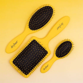 Drybar Super Lemon Drop detangling wet hair to reduce tugging and make post-shower styling easier
