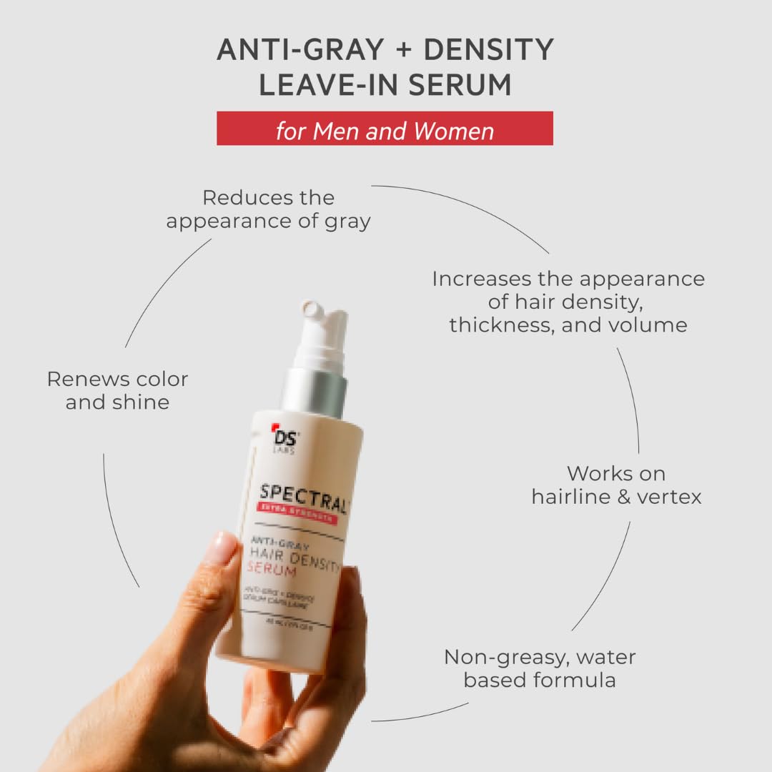 DS Laboratories applying serum to scalp from hand demonstrating direct delivery and targeted cosmetic benefit