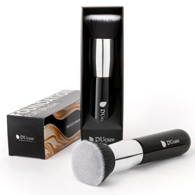 DUcare brush applying liquid foundation for seamless coverage