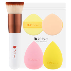 DUcare brush held in hand showing size for accurate scale