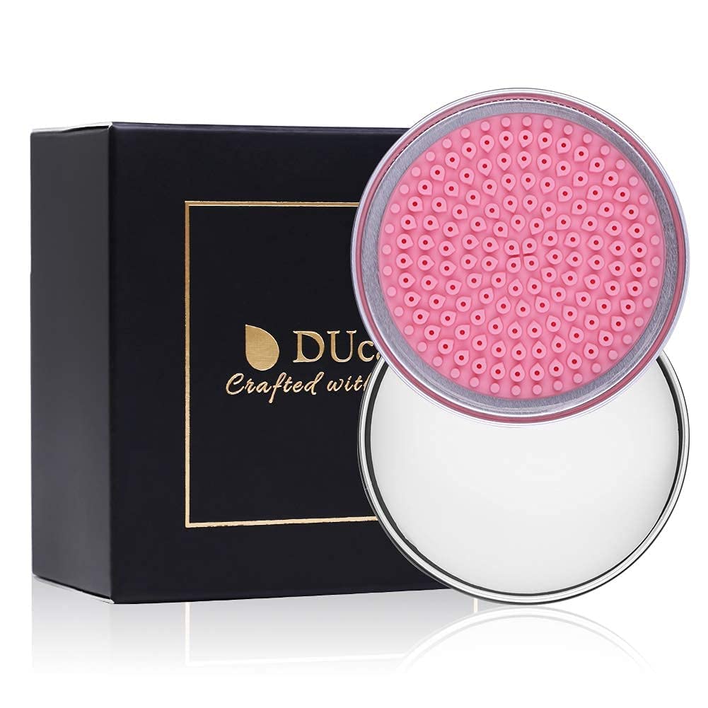 DUcare soap next to makeup sponges showing gentle stain removal and conditioning