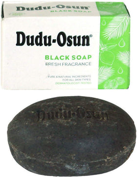 Dudu-Osun bar close-up texture highlighting natural ash and creamy lather benefit