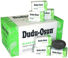 Dudu-Osun bars styled in bathroom setting conveying sustainable, everyday skincare convenience