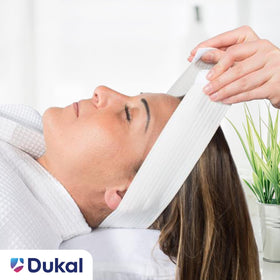 Dukal headband in use during spa facial, keeps hair neatly away