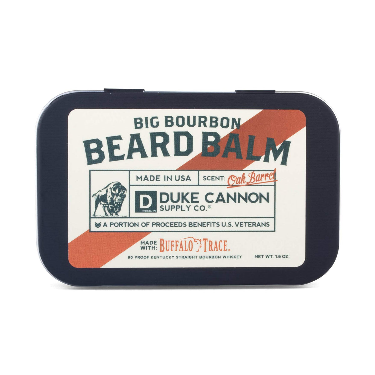 Duke Cannon travel tin next to keys showing portable grooming convenience