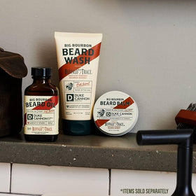 Duke Cannon in-shower use rinsing beard to show effective cleansing with moisture
