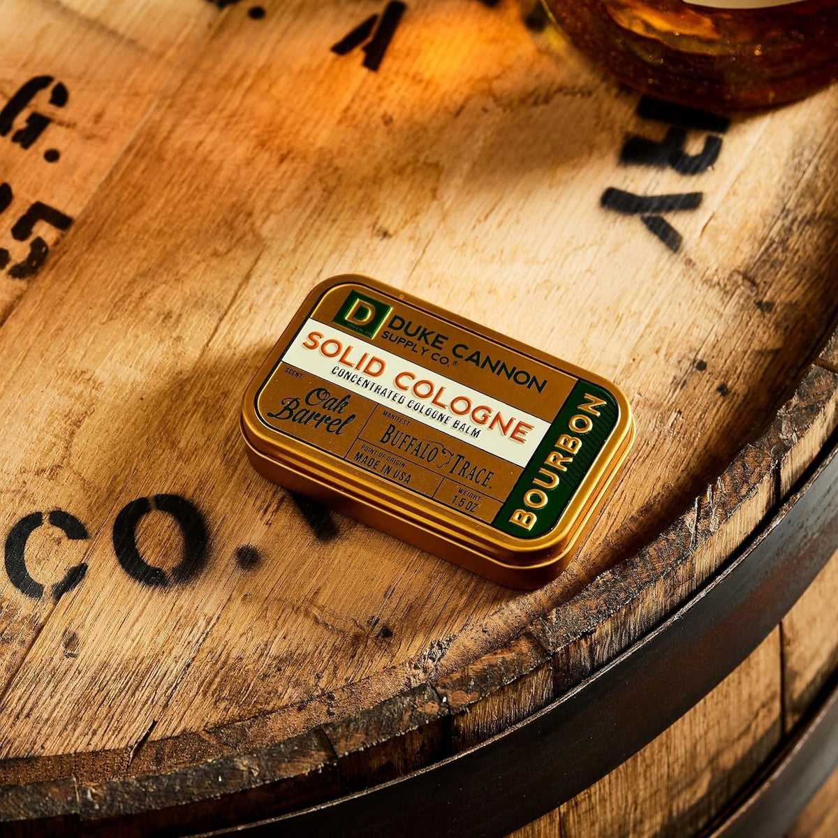 Duke Cannon bourbon solid cologne closeup label highlighting bourbon barrell notes