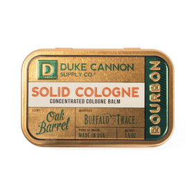 Duke Cannon bourbon solid cologne front tin showing package and convenience