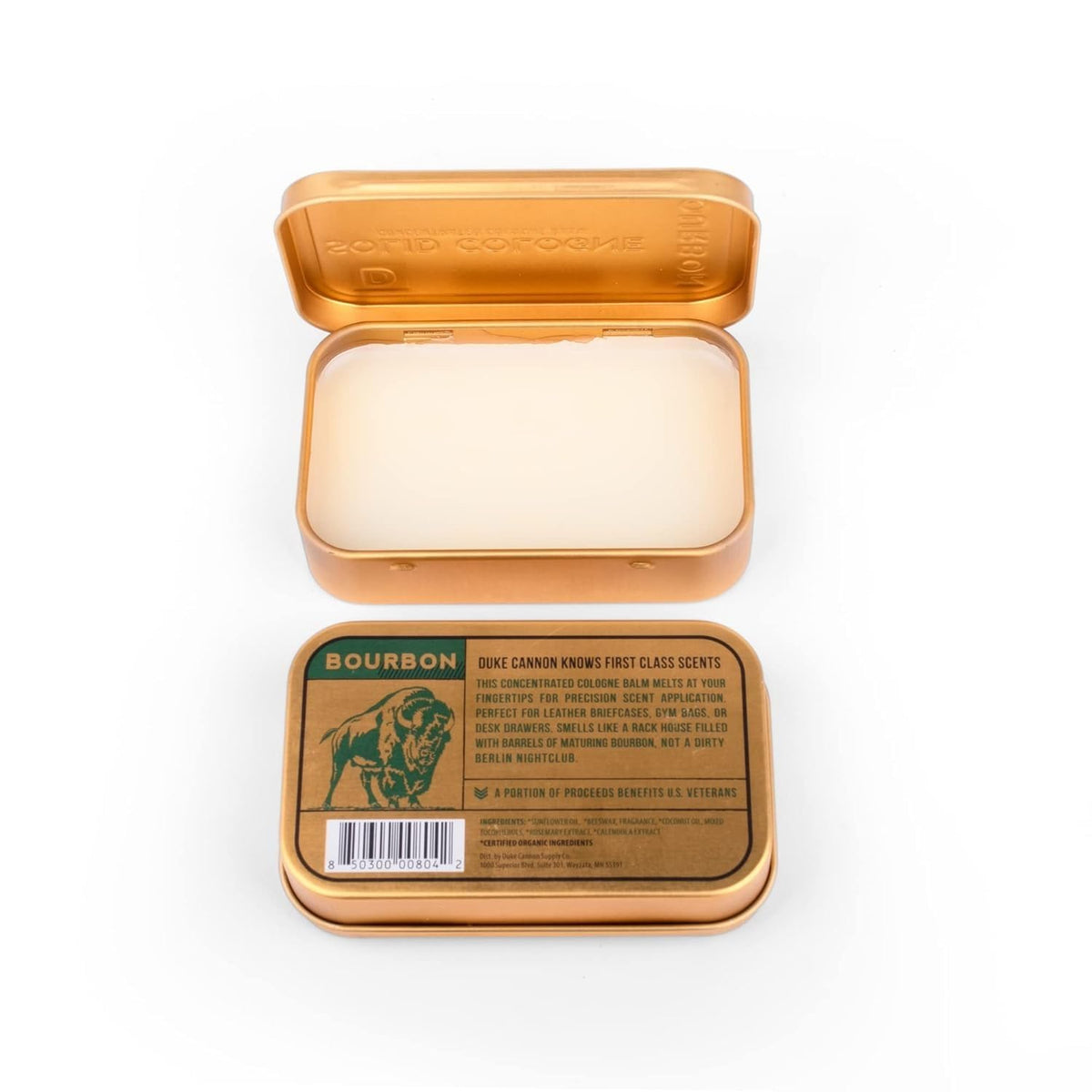 Duke Cannon bourbon solid cologne in jacket pocket for discreet on-the-go touch-ups