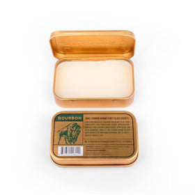Duke Cannon bourbon solid cologne in jacket pocket for discreet on-the-go touch-ups