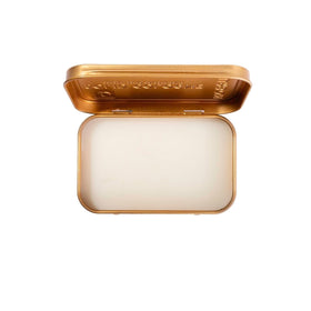 Duke Cannon bourbon solid cologne open tin revealing smooth balm texture