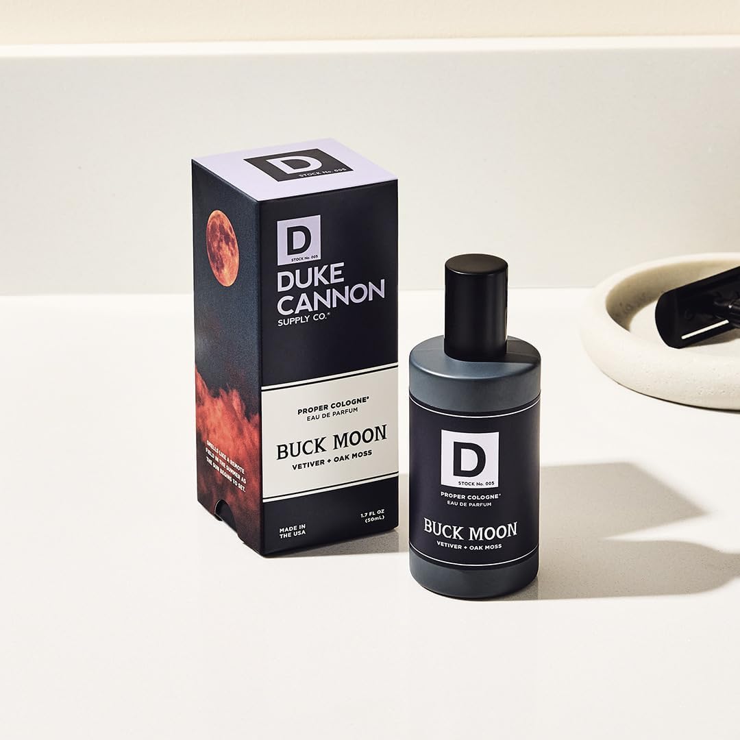 Duke Cannon bottle next to hand showing 1.7 fl oz portable travel size