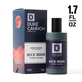 Duke Cannon hand spraying cologne for even application and balanced projection